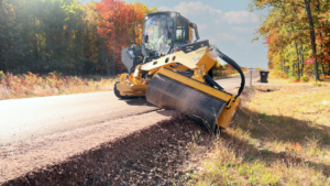 offset vibratory roller compactor for slopes and ditches