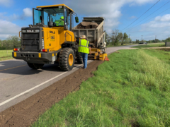 Road Widener loader attachment shouldering with gravel