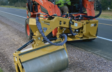 Offset Vibratory Roller compacting ditch